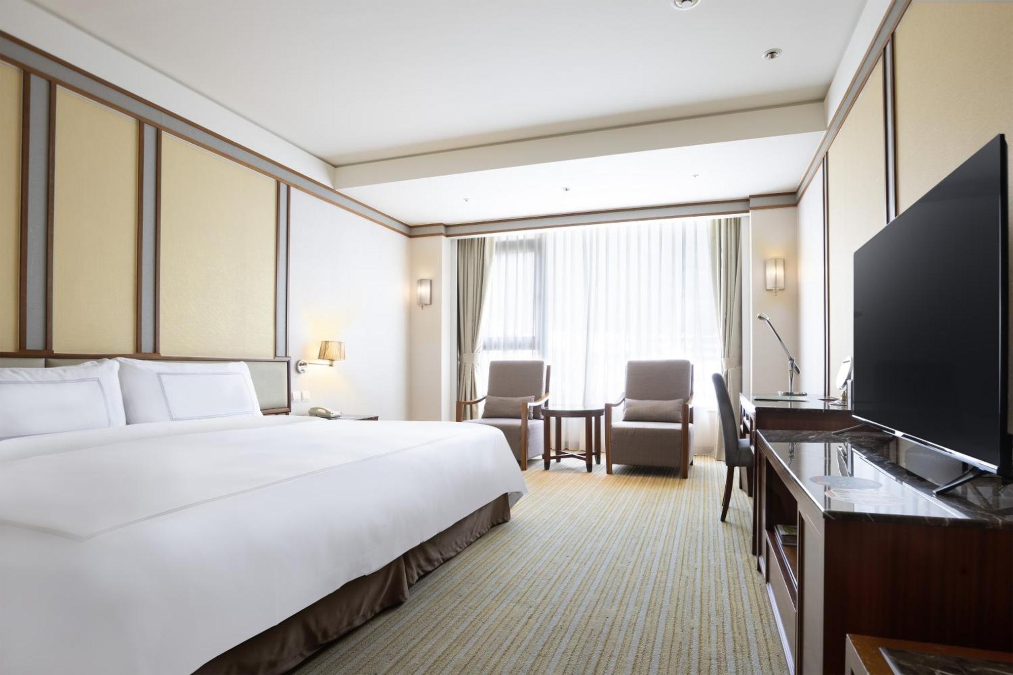 Evergreen Resort Hotel - Jiaosi Цзяосі Екстер'єр фото Deluxe Room